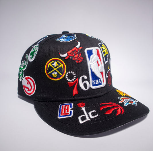 Gorra New Era NBA All Over Logo 9FIFTY Snapback Negra