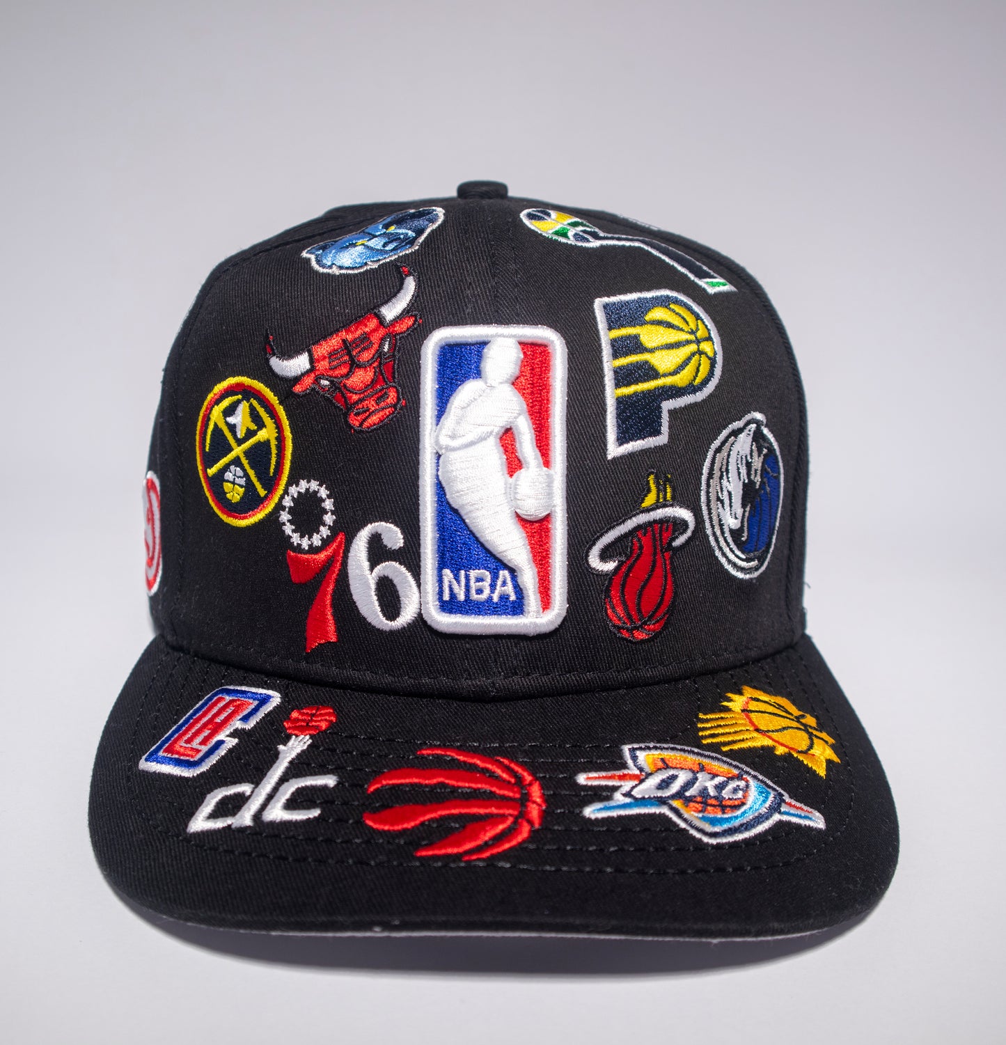 Gorra New Era NBA All Over Logo 9FIFTY Snapback Negra