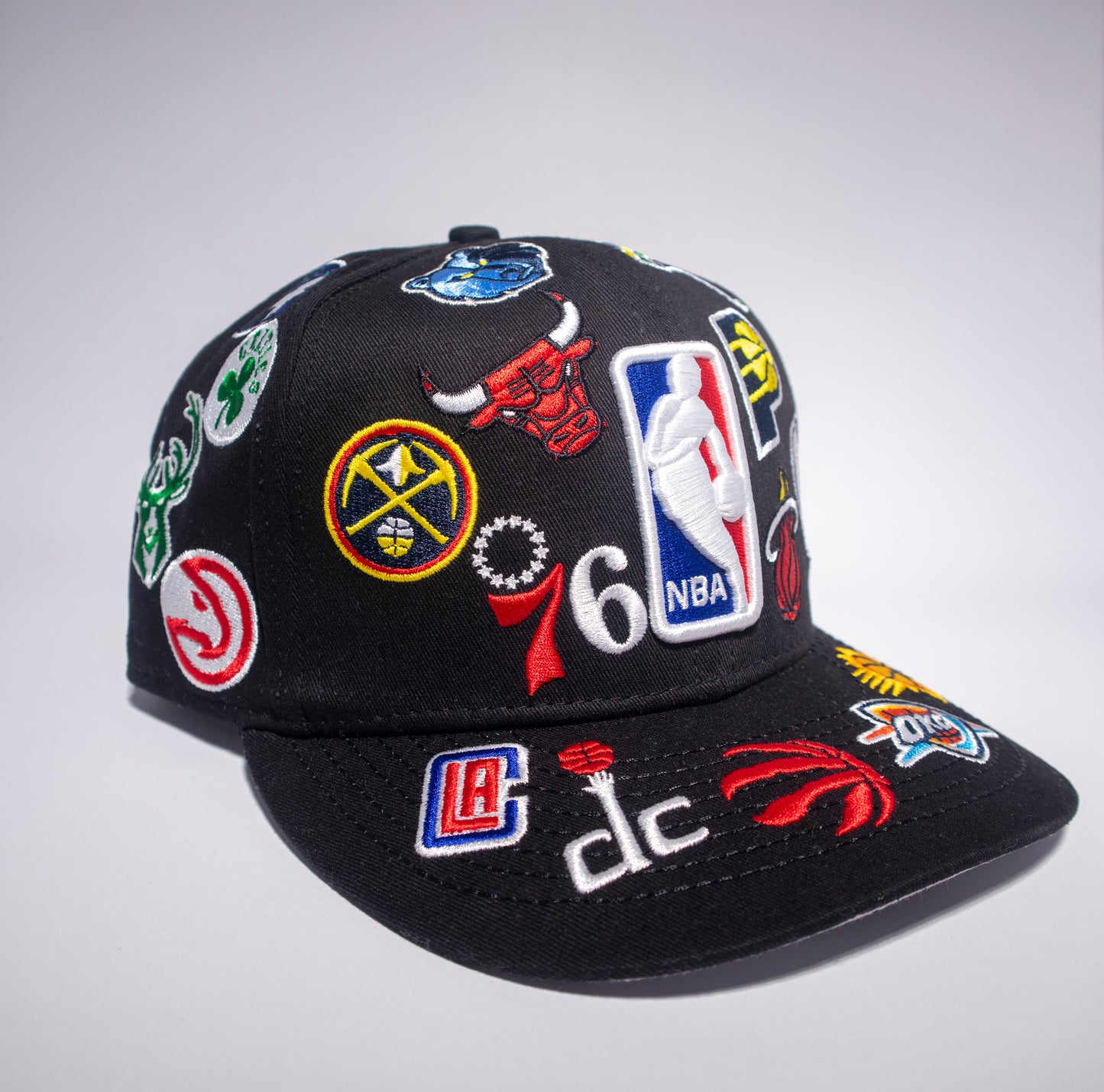 Gorra New Era NBA All Over Logo 9FIFTY Snapback Negra