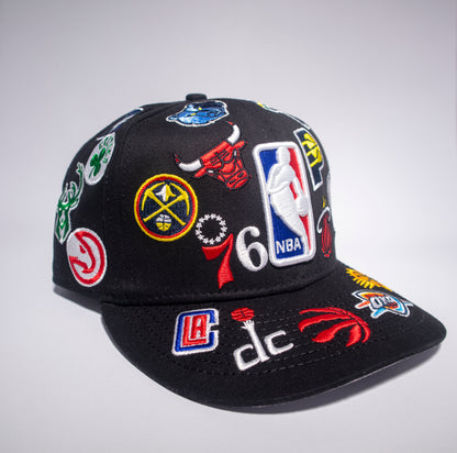 Gorra New Era NBA All Over Logo 9FIFTY Snapback Negra